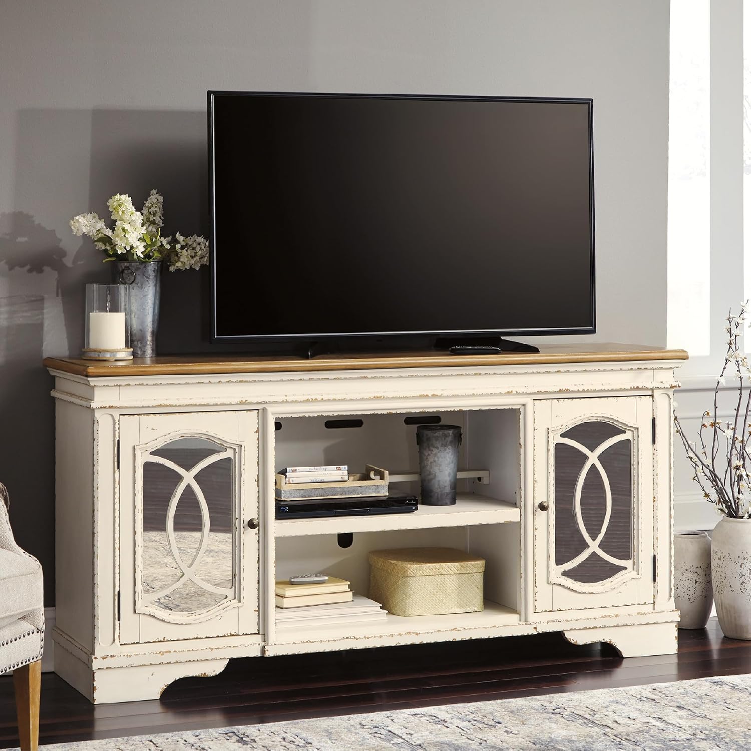 Signature Design by Ashley Realyn Farmhouse TV Stand with Fireplace Option Fits TVs up to 72', 2 Cabinet Doors and Adjustable Storage Shelf, White & Rustic Brown